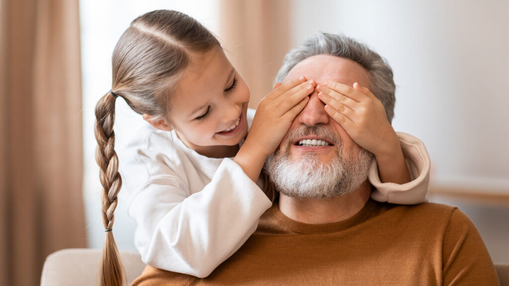 An ageing man and a little girl